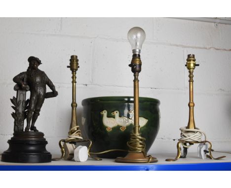 A miscellany to include three brass lamps, a planter and figurine. The planter is decorated with ducks and measures H.21 D.31