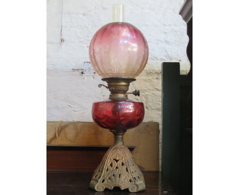 VINTAGE OIL LAMP WITH CRANBERRY GLASS RESERVOIR AND SHADE 