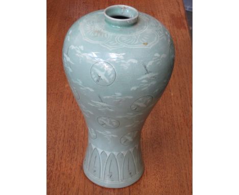 DECORATIVE ORIENTAL STYLE LIGHT GREEN GLAZED POTTERY PLUM VASE (AT FAULT), APPROXIMATELY 33cm HIGH 