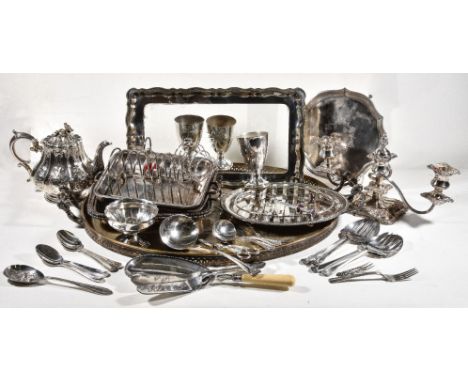 An Edwardian silver shaped circular salver by George David Rattray, Sheffield 1908, engraved with a floral wreath, on three b