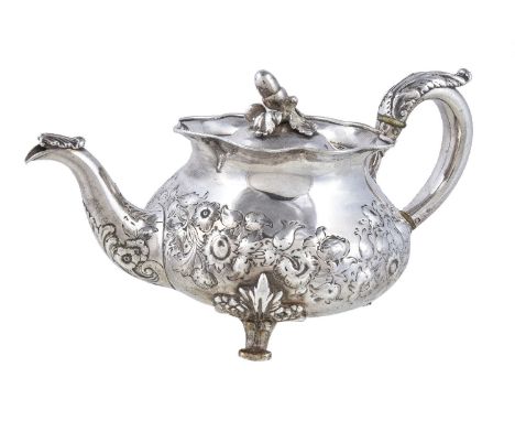 ϒA William IV silver circular baluster teapot by Robert Hennell II, London 1833, with an acorn finial to the domed cover, a s