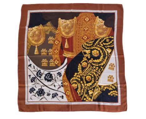 Versace, Barocco, a silk foulard, in the Barocco print, with capped corners, 135cm wide; Les Must de Cartier, a blue and crea