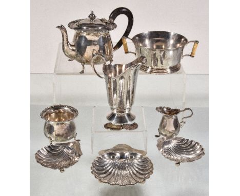 ϒ A silver three piece tea service by Walker & Hall, Birmingham 1900, the tea pot with an orb finial and a composition loop h