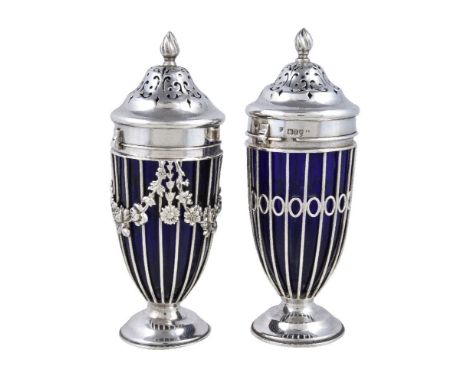 Two similar late Victorian silver and blue glass sugar castors by Haseler Brothers, London 1900 & 1901, with wrythen conical 