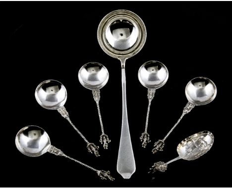 A silver trefid pattern soup ladle by The Goldsmiths & Silversmiths Ltd, London 1919, 33.5cm (13 1/4in) long; five spoons in 