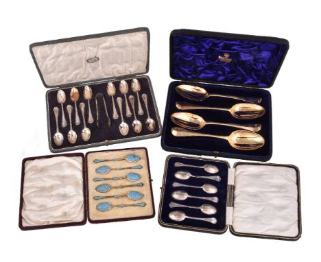 Four cased sets of silver spoons, comprising: four later gilt old English table spoons, at least three George II by James Wil