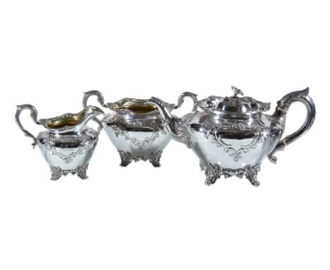 ϒAn early Victorian Scottish silver circular baluster three piece tea service by James McKay, Edinburgh 1837-38, the tea pot 