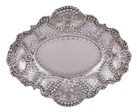 A late Victorian silver shaped oval basket by Harrison Brothers & Howson, Sheffield 1896, embossed with flowers, C-scrolls, s