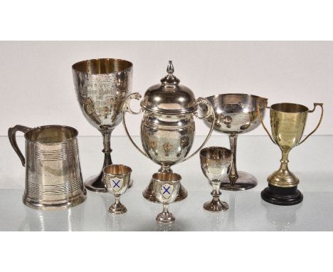 A collection of silver items, to include: a silver twin handled cup and cover by Charles S. Green & Co. Ltd., Birmingham 1928
