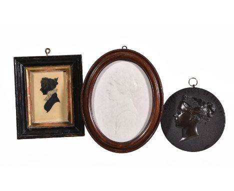 Mary Pownall (1862-1937), an oval plaster relief plaque a young lady, shoulder length in profile, signed and dated 1914, 14cm
