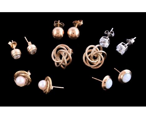 A collection of ear studs, to include a pair of knotted 9 carat gold and cultured pearl set ear studs; a pair of 9 carat gold