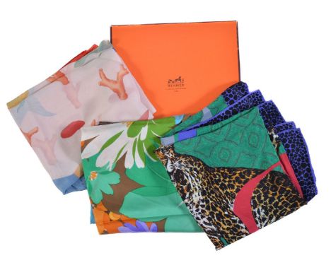 Hermes, Arcs en Ciel, a silk scarf, designed by Julia Abadie, in blue, red and white, 88cm wide, in an Hermes box; and three 