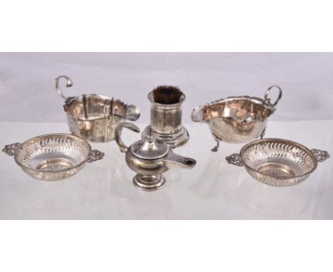 Six silver items, comprising: a pair of sweet dishes by Synyer & Beddoes, Birmingham 1925; a shaped oval sauce boat by Mappin