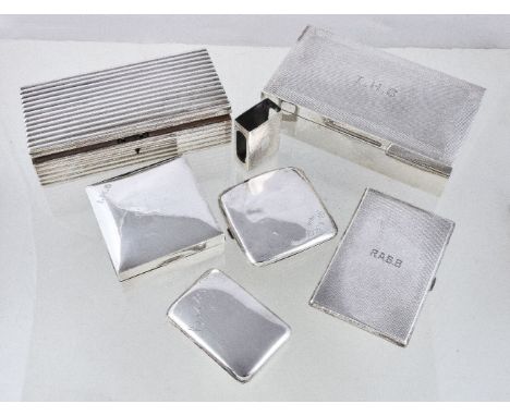 A collection of silver cigarette boxes and cases, to include: a silver rectangular cigarette box by Garrard & Co. Ltd., Londo