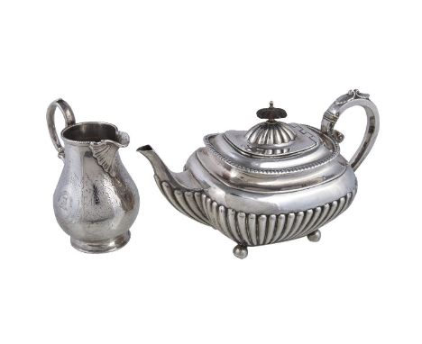 ϒA silver oblong half reeded teapot and a Victorian cream jug, the tea pot by James Dixon & Sons Ltd, Sheffield date worn, wi