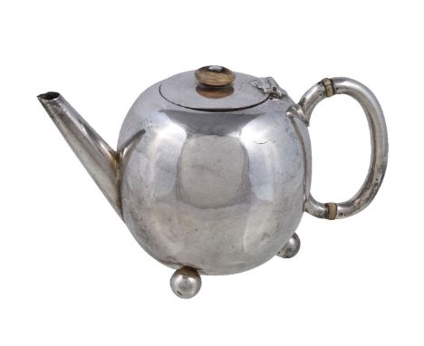 ϒA Victorian silver ovoid small tea pot by William Hutton & Sons, London 1885, with an ivory button finial and ivory spacers 
