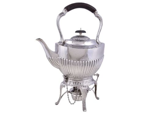 An Edwardian silver oval half fluted kettle on stand by William Hutton & Sons Ltd., Sheffield 1901, with a composition loop h