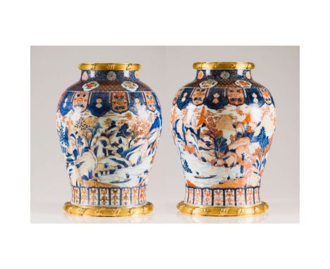 A pair or large size vases, Chinese export porcelain, Blue underglaze, iron oxide and gilt decoration of landscapes and figur