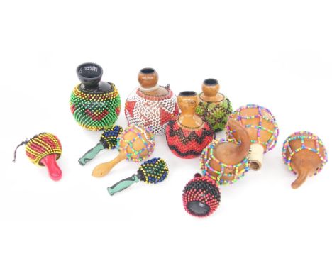 Selection of professional Shekere and gourd cabasa including pearl and other examples