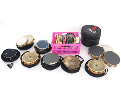 Good selection of tambourine type instruments to include a mountable pearl tambourine with muffle head, two black swamp percu