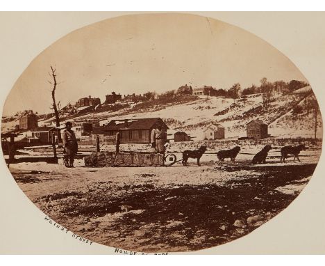 Benjamin Upton (American, 1818-1910). Oval cabinet card photograph depicting a dog sled team in St. Paul, Minnesota in the wi