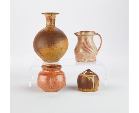 Group of four studio pottery ceramic vessels. Two Warren MacKenzie (American, 1924-2018) vessels, the mug and the small orang