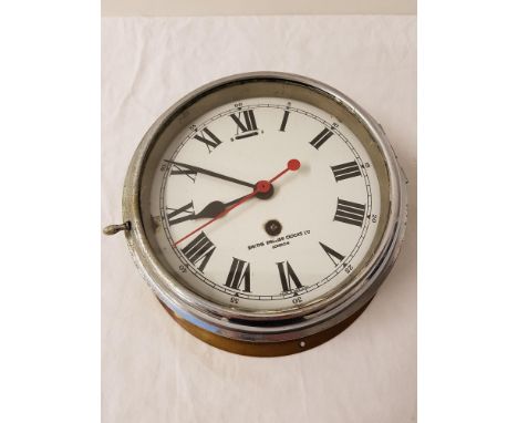 SMITHS PORTHOLE STYLE CLOCKwith circular enamel dial, Roman numerals and 30 hour movement, with winding key 