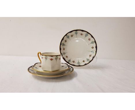 LIMOGES PORCELAIN TEA SETthe white ground with blue and gilt border and floral swags, comprising cups and saucers, milk jug, 