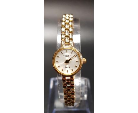LADIES NINE CARAT GOLD ROTARY ELITE WRISTWATCHthe dial with baton five minute markers, on nine carat gold bracelet strap, tot