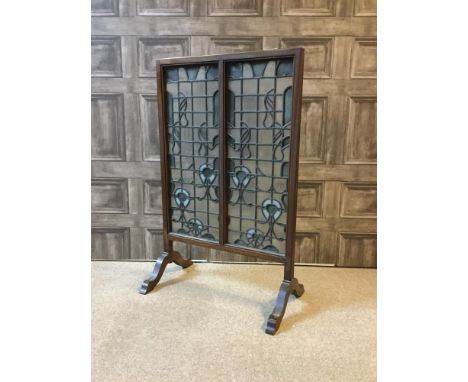 MAHOGANY FRAMED FIRESCREEN, inset two leaded glass panels, on end supports, 78cm high, 50cm