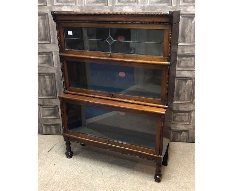 PAIR OF MAHOGANY SECTIONAL BOOKCASES, by Peter Graham, Hillhead, Glasgow, each three sections high, with upper leaded glass d