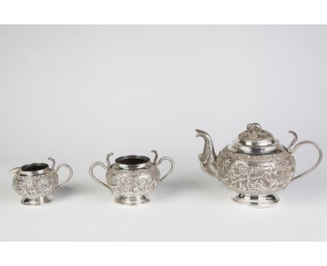 AN INDIAN SILVER COLOURED METAL TEA SERVICE OF THREE PIECES, globular and raised on plain circular pedestal foot, each piece 