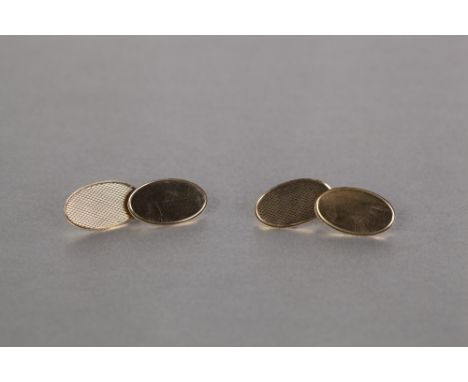 PAIR OF 9ct GOLD DOUBLE OVAL CUFF LINKS, with engine turned tops, in associated case, 4.7gms (2) 