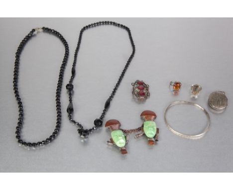 TWO SILVER AND STONE SET RINGS; SILVER BANGLE, an oval LOCKET PENDANT, JET BEAD NECKLACE and another, pair of CLOAK LINKING B