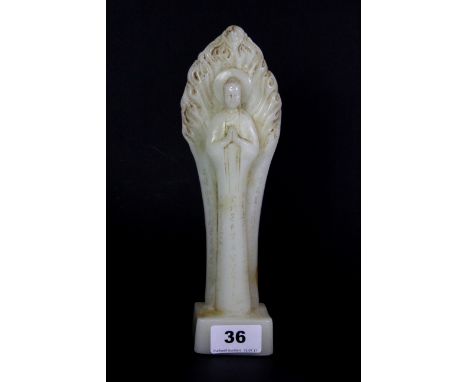 A Chinese carved jade / hardstone figure of a standing Goddess, extensively engraved with characters, H. 25cm.