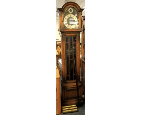 A 1920's chiming oak grandmother clock. H.189cms.