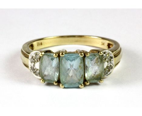 A 9ct yellow gold blue topaz and diamond set ring (P.5).