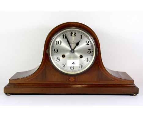 A 1920's inlaid mahogany veneered mantle clock, W.43cm.