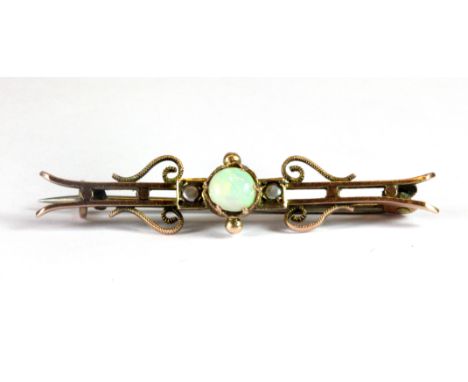 A rose gold (tested minimum 9ct gold) bar brooch set with an opal and seed pearls, L. 4.1cm.