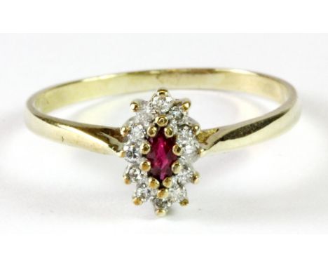 A 9ct yellow gold (stamped 9ct) ruby and diamond cluster ring (R.5).