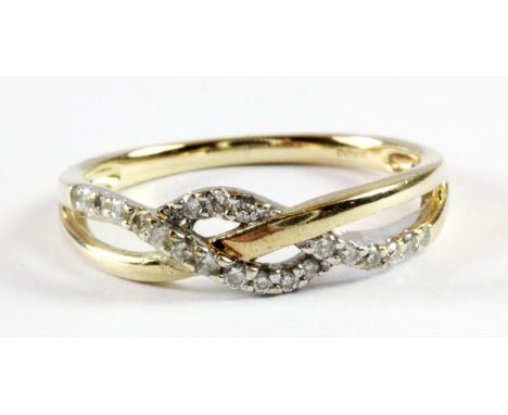 A 9ct yellow gold diamond set ring (N.5).