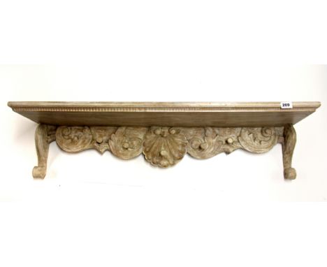 A carved wooden hall shelf and hat rack, W. 105cm, Depth 23cm