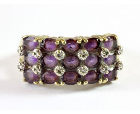 A 9ct yellow gold amethyst and diamond set ring (N).