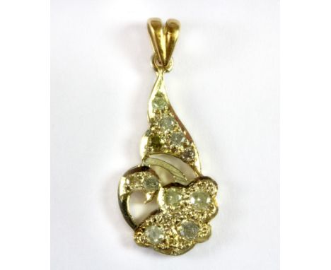 A yellow metal (tested minimum 9ct gold) diamond set pendant, L. 3.2cm.