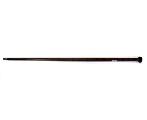 A rare 19th century ivory capped walking cane, made from leather washers threaded on a steel core, L.90cm.