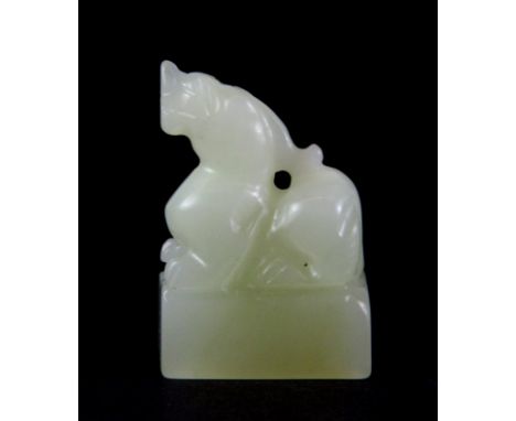 A small Chinese nephrite jade lady's seal. H.5cms