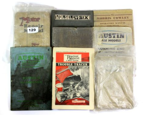 A quatity of vintage motor car manuals.