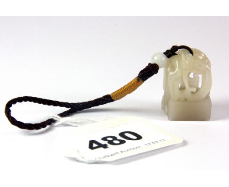 A very fine 19th century Chinese white jade ladies seal with later silk carrying cord. Seal size 2.6x1.6x1.8cms