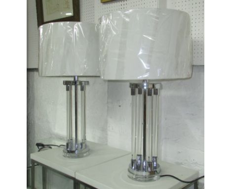 TABLE LAMP, column type in lucite, with brass effect mounts, with shades, 68cm H. 