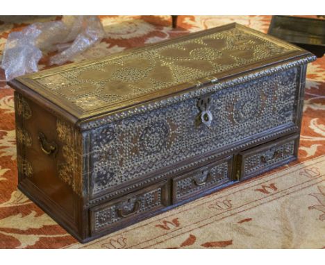 ZANZIBAR TRUNK, 19th century Moorish hardwood and brass bound and studded with rising lid and three drawers, 41cm H x 94cm x 